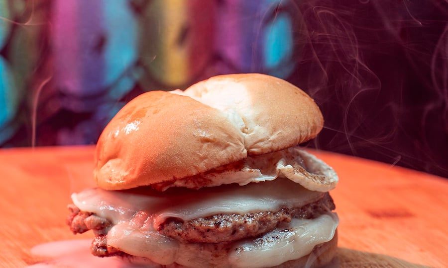 Bebot Burger — lumpia smash patty with fried egg on a soft bun