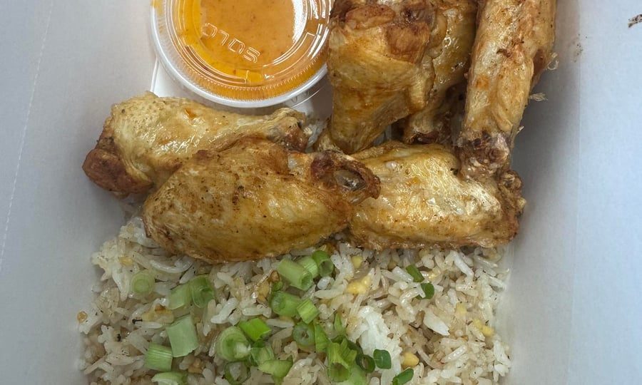 Crispy sinigang wings served with garlic fried rice